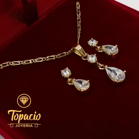 Set de Aretes + Cadena con Dije Gotas 18K