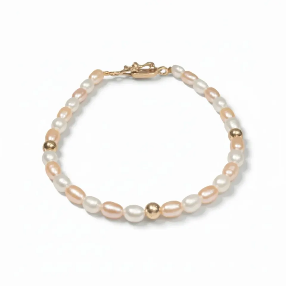Pulsera de Perlas Bicolor con Detalles en Oro 18K