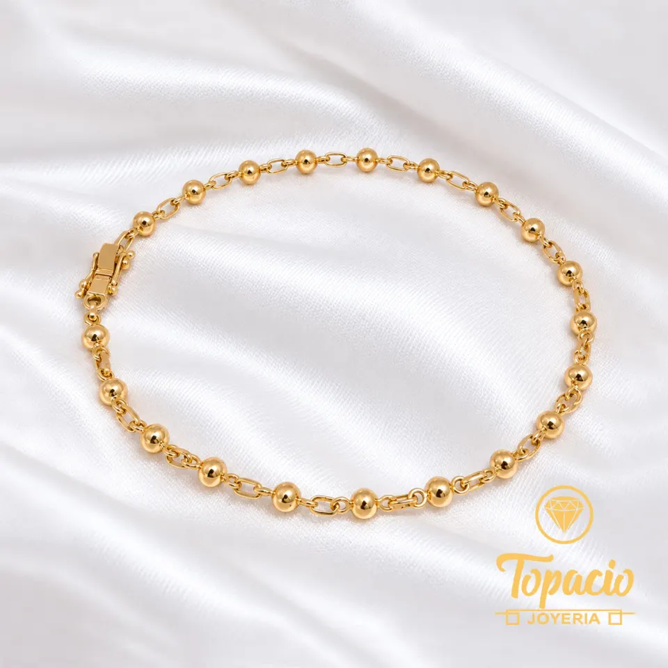Tobillera Bolitas 18K