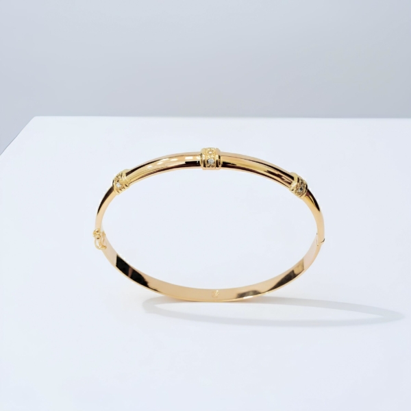 Puñera Oval Media Caña 18K