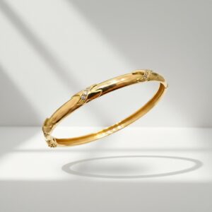Puñera con Detalles de Brillo en Oro 18k