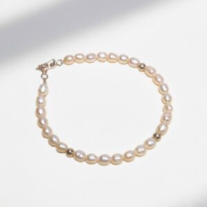Pulsera de Perlas Naturales con Detalles en Oro 18k